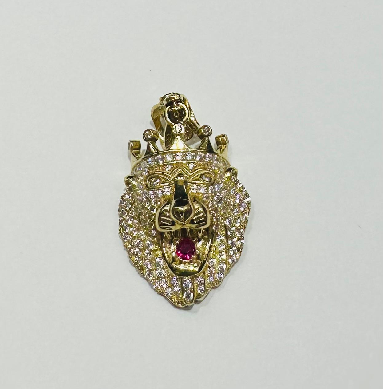 10K GOLD LION PENDANT WITH WHITE SAPPHIRE- WEIGHT: 6.1gm
