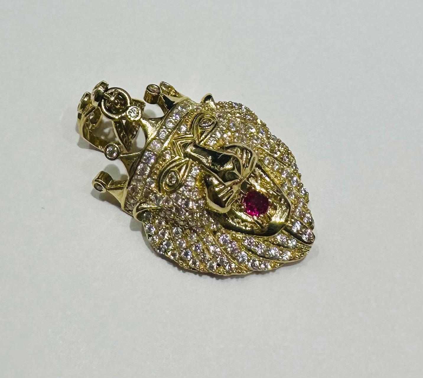 10K GOLD LION PENDANT WITH WHITE SAPPHIRE- WEIGHT: 6.1gm
