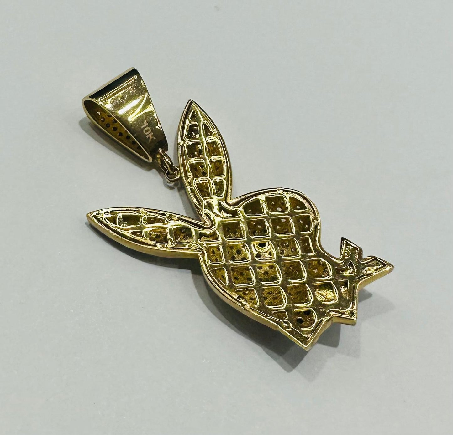 10K GOLD PLAYBOY PENDANT WITH WHITE SAPPHIRE- WEIGHT: 7.7gm