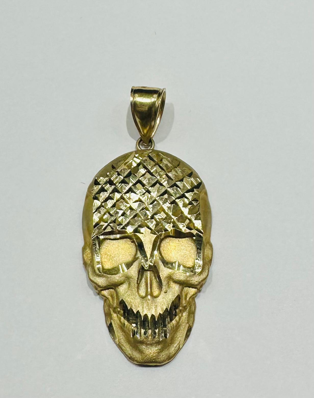 10K GOLD SKULL PENDANT- WEIGHT:  5.6gm