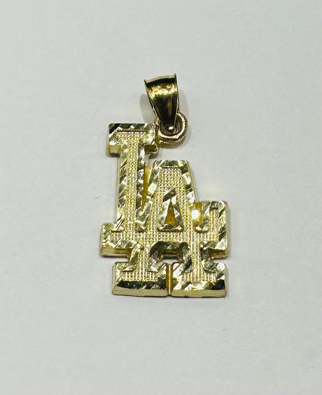 10K GOLD "LA" PENDANT- WEIGHT:  1.8gm