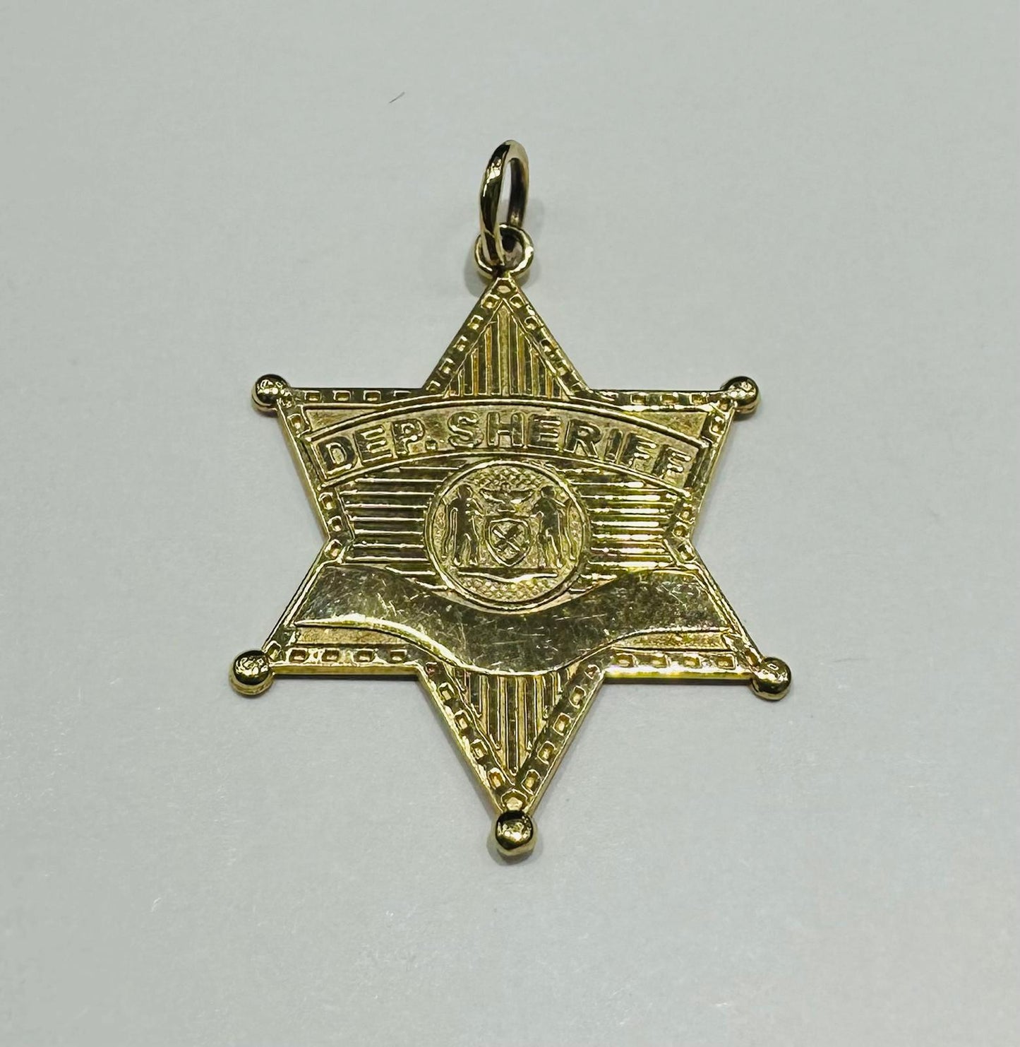 10K GOLD SHERIFF CHARM PENDANT- WEIGHT:  1.8gm