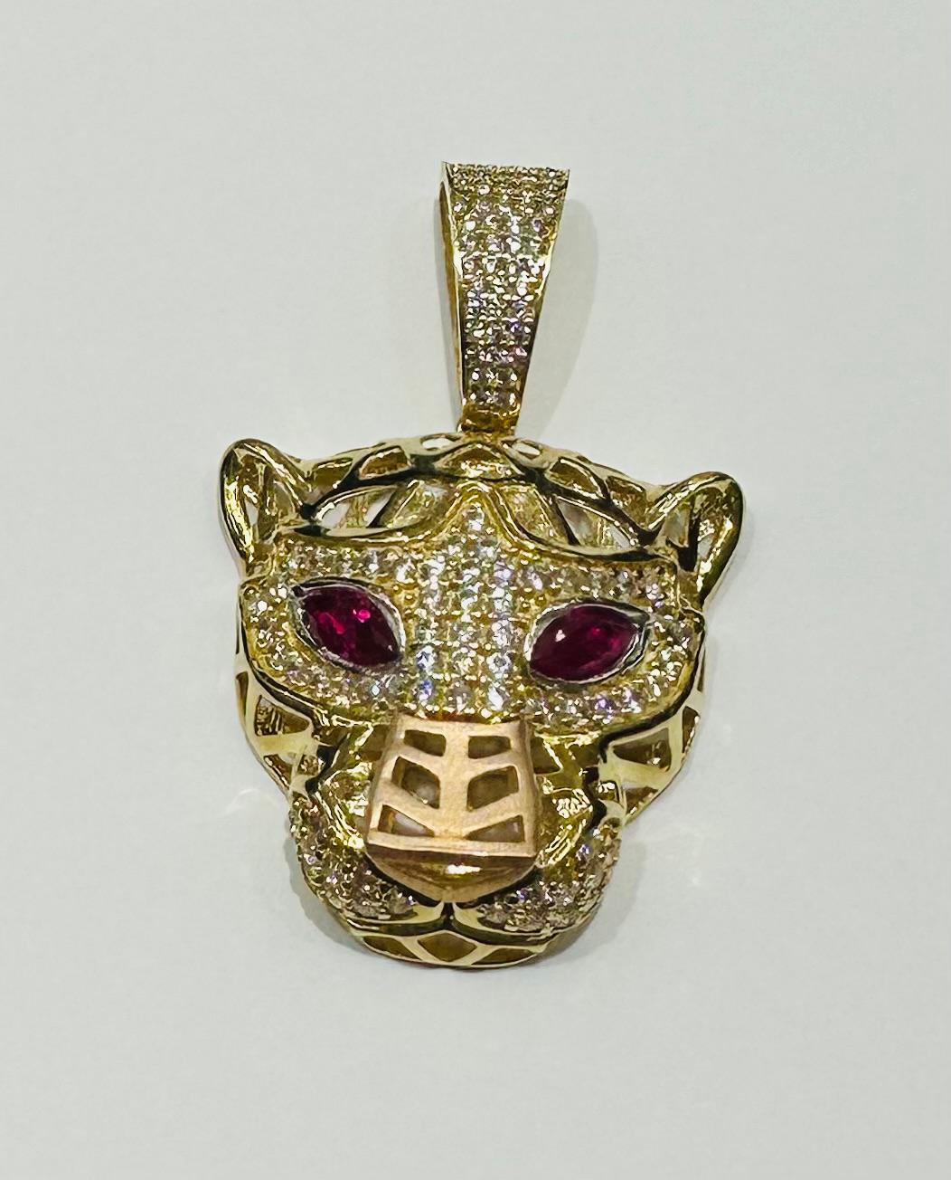 10K GOLD TIGER PENDANT WITH SAPPHIRE STONES- WEIGHT:  7.0gm