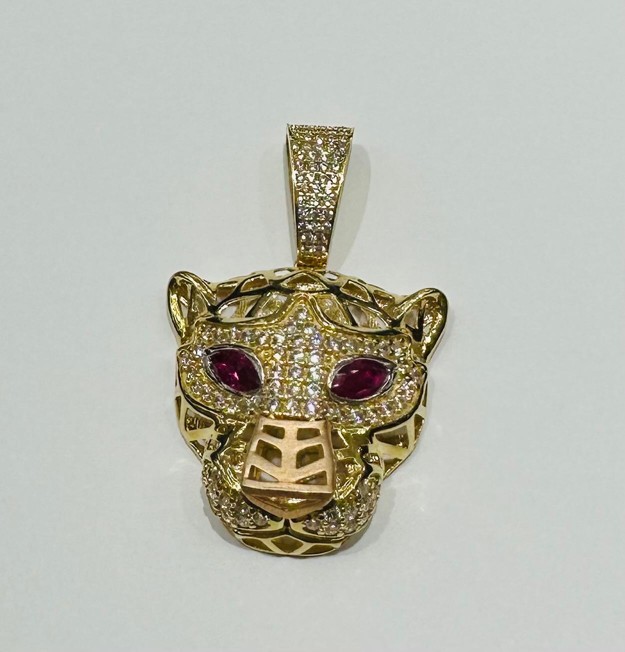 10K GOLD TIGER PENDANT WITH SAPPHIRE STONES- WEIGHT:  7.0gm