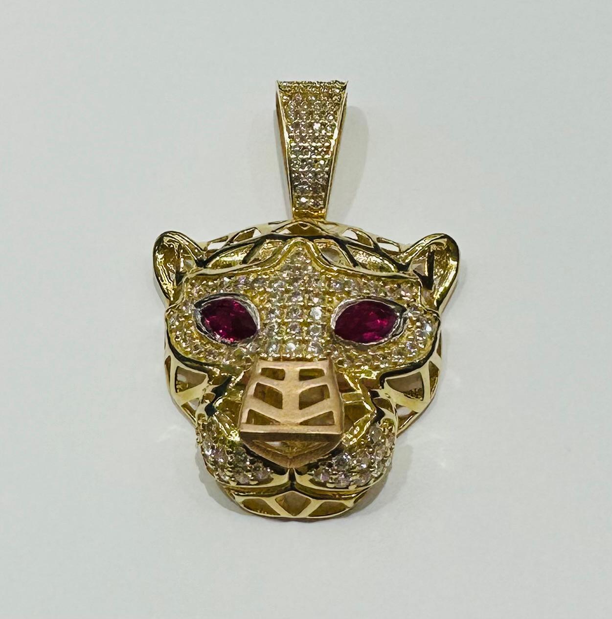 10K GOLD TIGER PENDANT WITH SAPPHIRE STONES- WEIGHT:  7.0gm