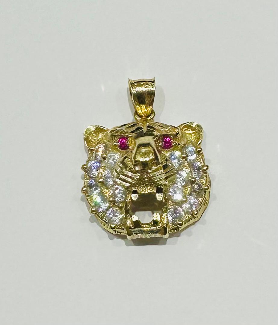 10K GOLD TIGER PENDANT WITH SAPPHIRE- WEIGHT:  5.5gm