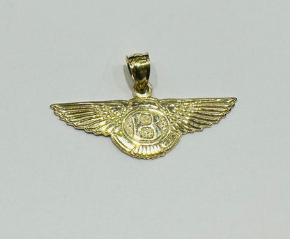 10K GOLD BENTLEY PEDANT- WEIGHT:  1.6gm