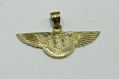 10K GOLD BENTLEY PEDANT- WEIGHT:  1.6gm