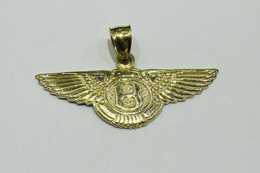 10K GOLD BENTLEY PEDANT- WEIGHT:  1.6gm
