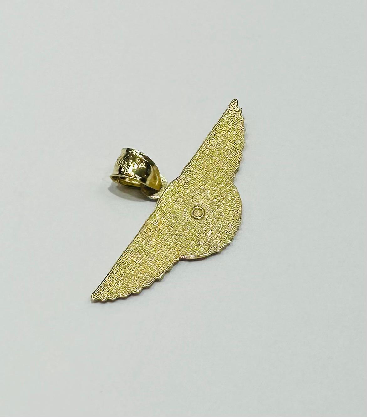 10K GOLD BENTLEY PEDANT- WEIGHT:  1.6gm