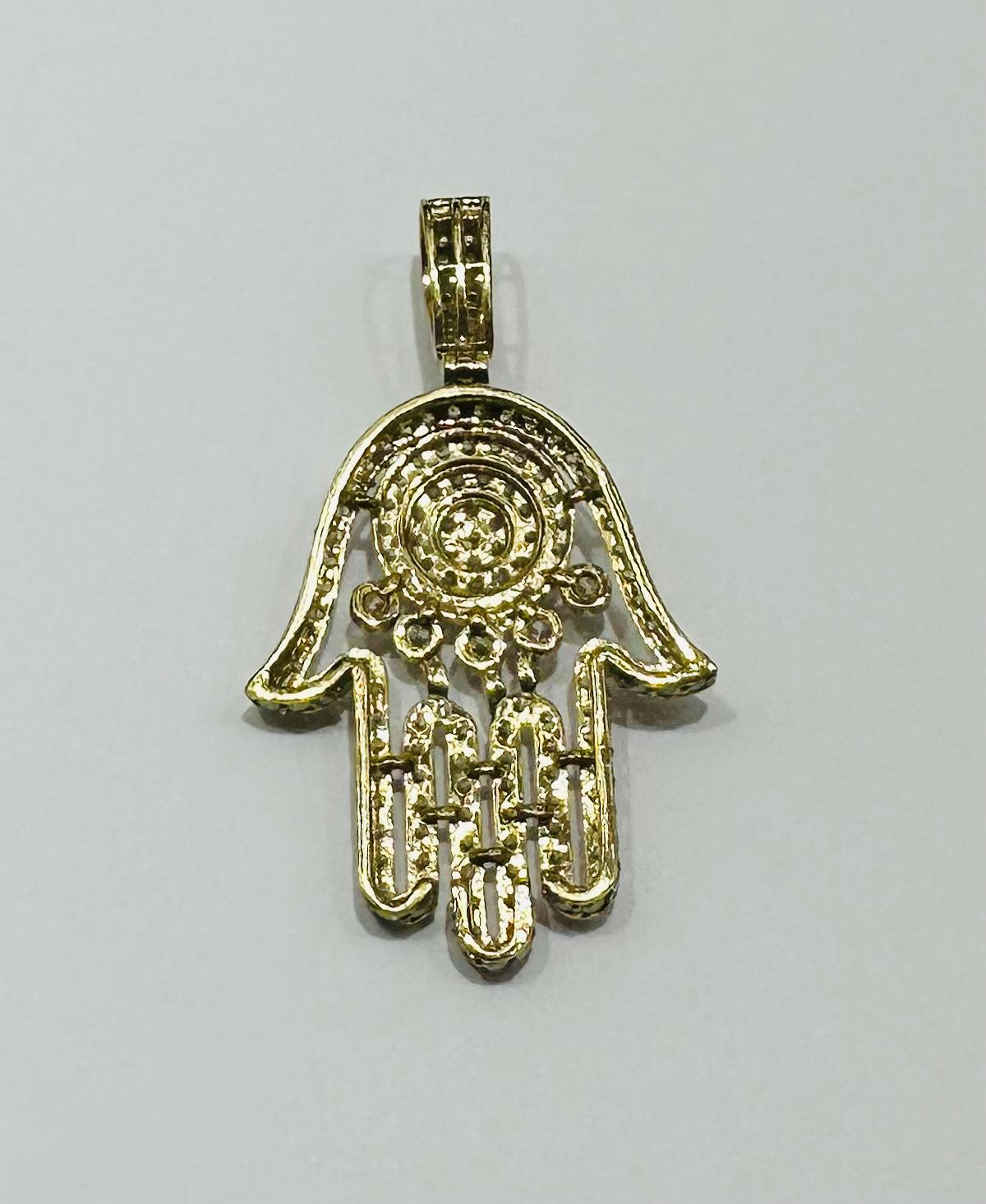 10K GOLD HAMSA PENDANT WITH WHITE SAPPHIRE- WEIGHT:  3.6gm