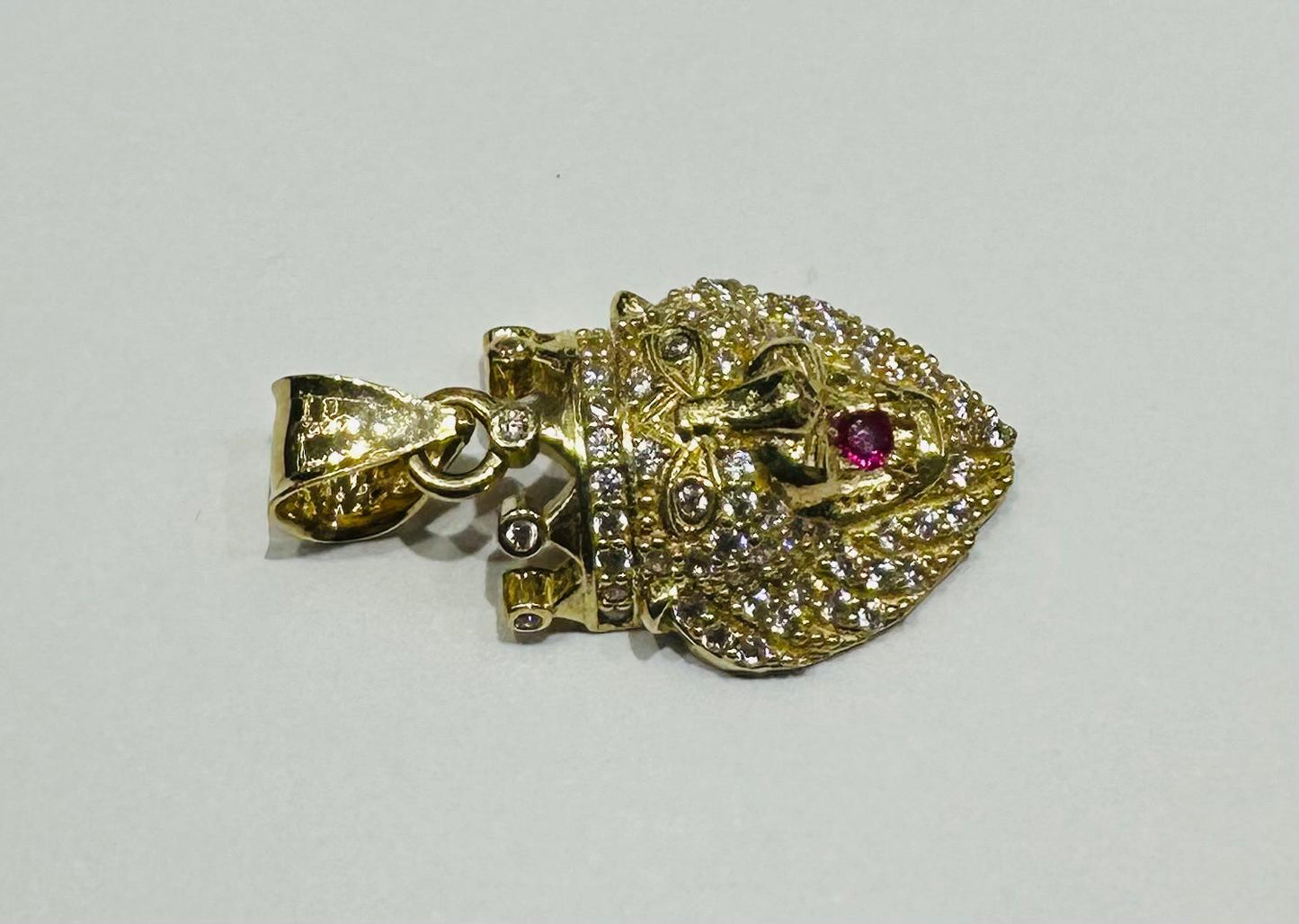 10K GOLD LION PENDANT WITH SAPPHIRE STONES- WEIGHT:  3.8gm