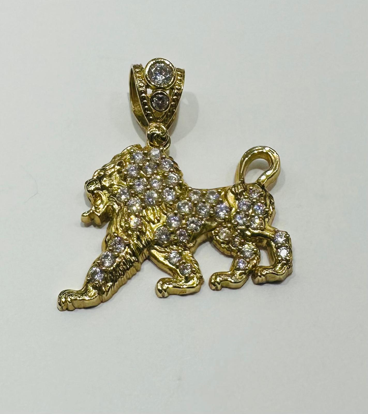 10K GOLD LION PENDANT WITH WHITE SAPPHIRE- WEIGHT:  5.1gm