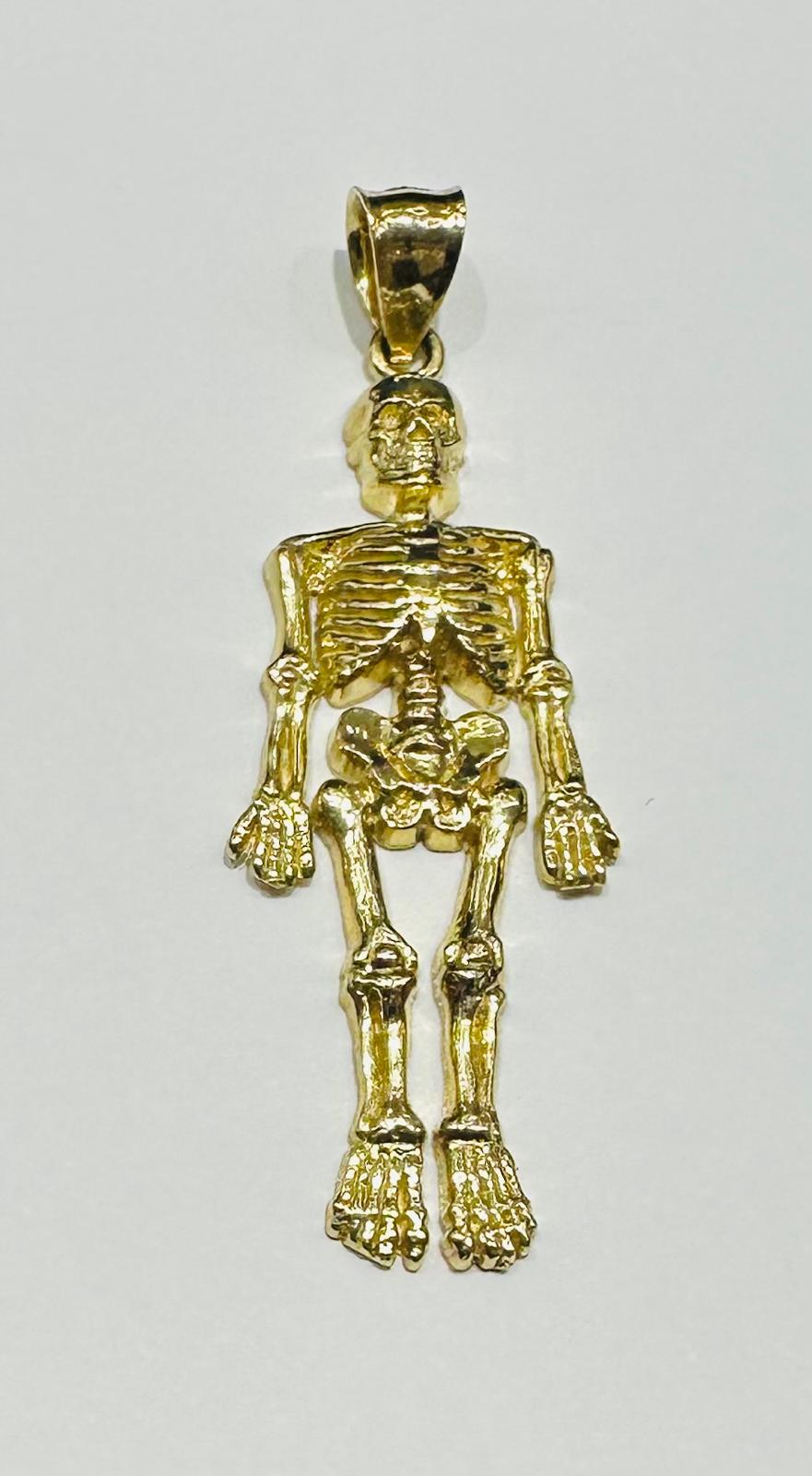 10K GOLD SKELETON PENDANT- WEIGHT:  4.0gm
