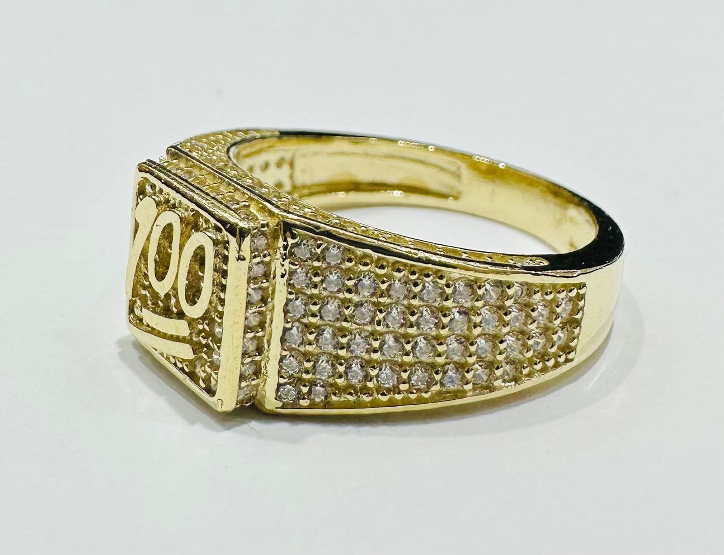 10K GOLD ONE HUNDRED SIGN RING WITH WHITE SAPPHIRE- WEIGHT: 6.7gm