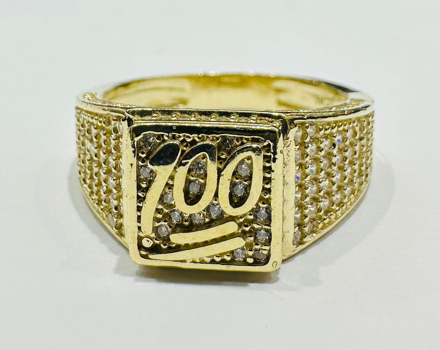 10K GOLD ONE HUNDRED SIGN RING WITH WHITE SAPPHIRE- WEIGHT: 6.7gm