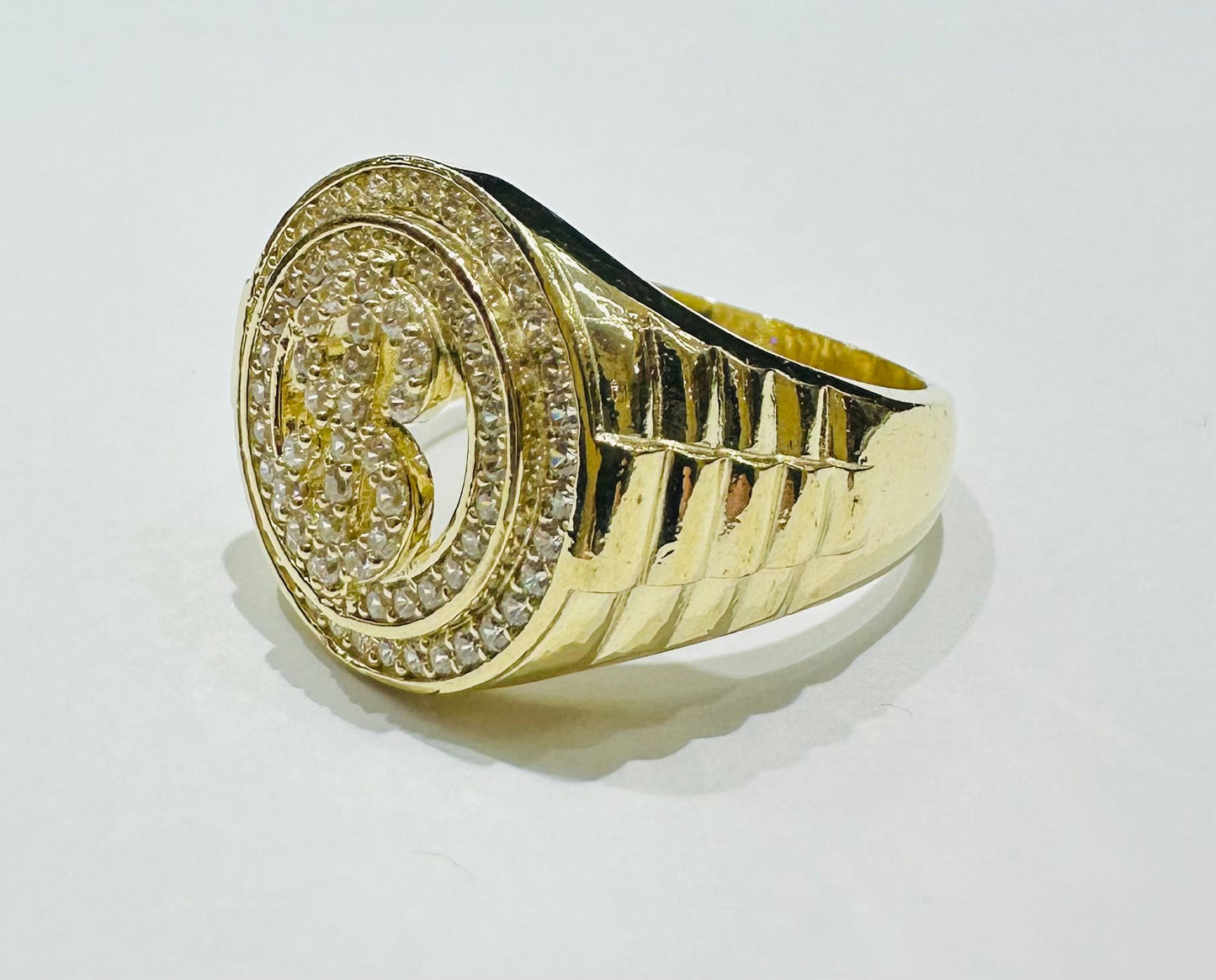 10K GOLD DOLLAR SIGN RING WITH WHITE SAPPHIRE- WEIGHT: 7.8gm