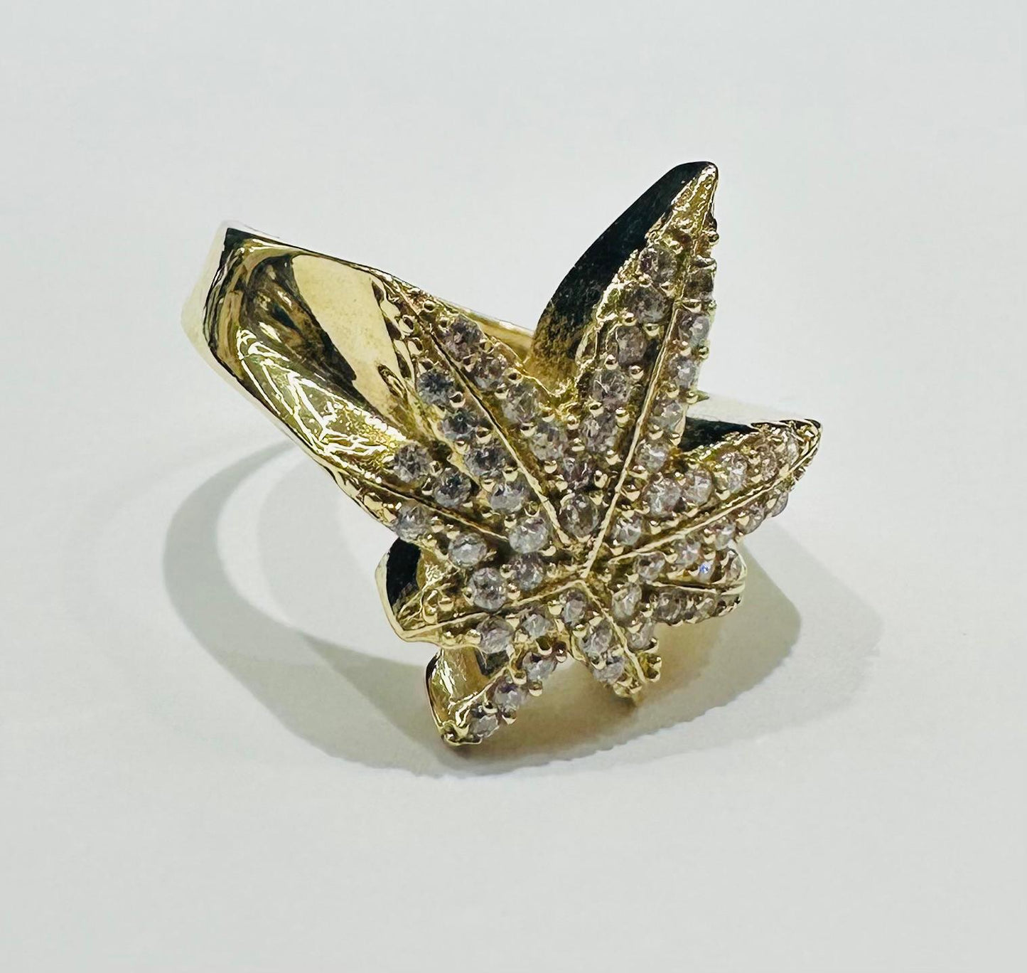 10K GOLD MAPLE LEAF RING WITH WHITE SAPPHIRE- WEIGHT: 3.9gm