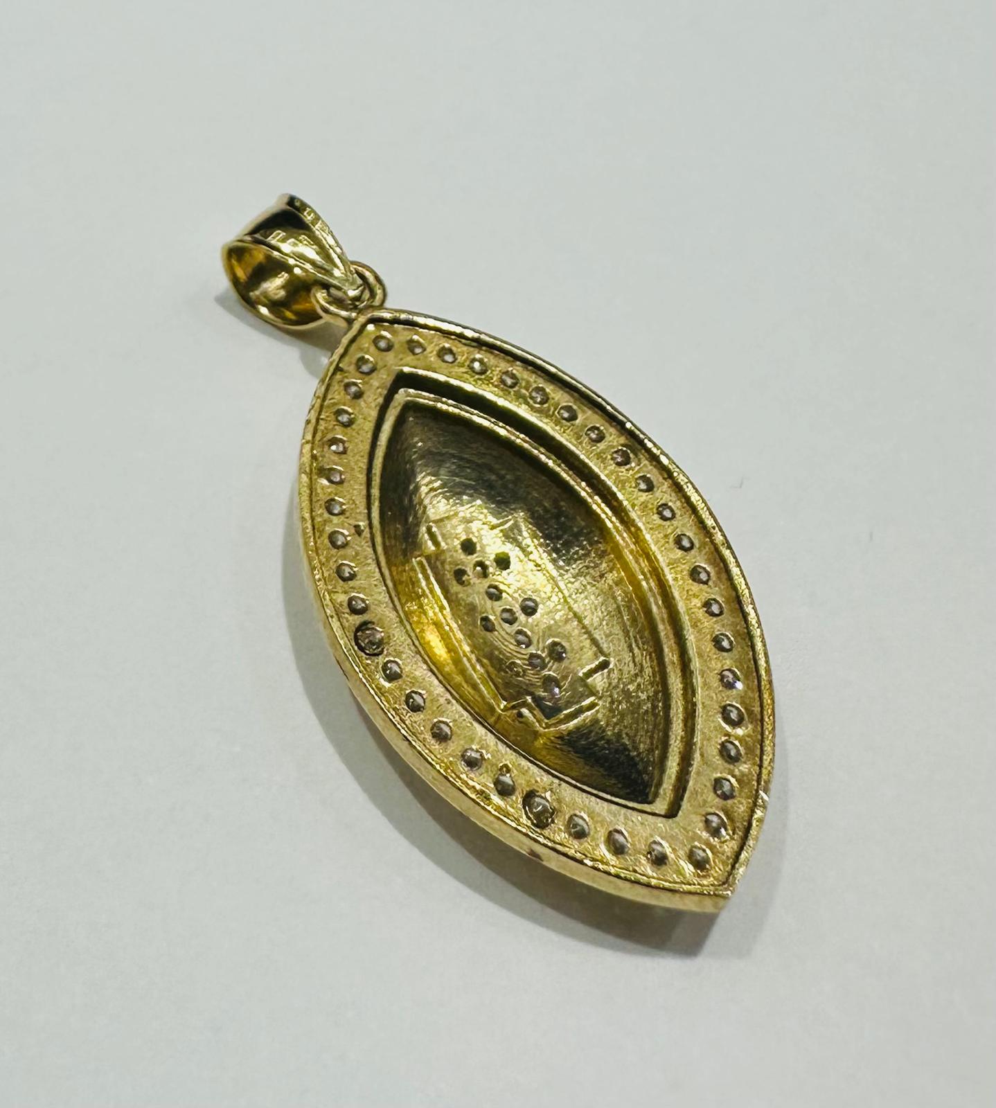 10K GOLD FOOTBALL PENDANT WITH WHITE SAPPHIRE- WEIGHT: 4.2gm