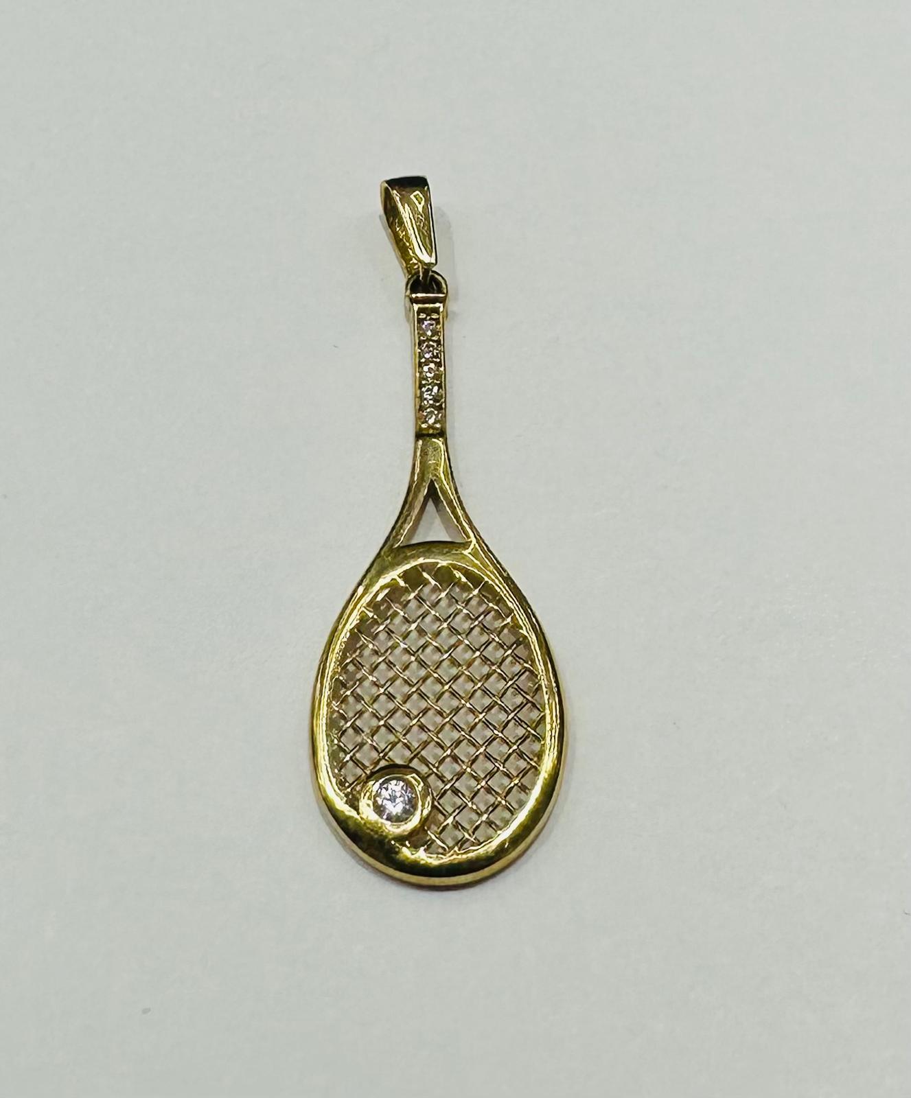 10K GOLD TENNIS RACKET PENDANT-  WEIGHT: 1.3gm