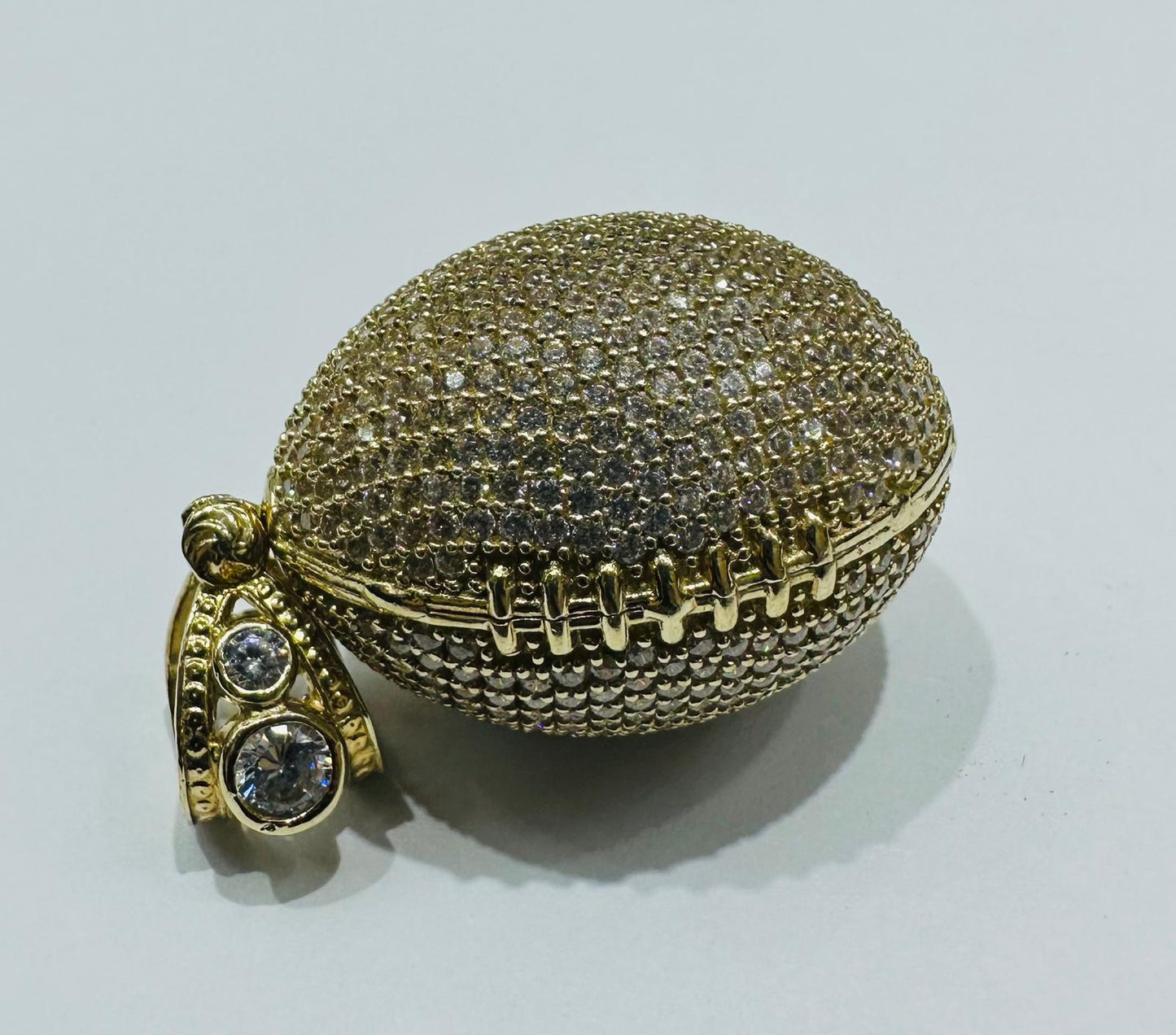 10K GOLD FOOTBALL PENDANT WITH WHITE SAPPHIRE-  WEIGHT: 15.3gm