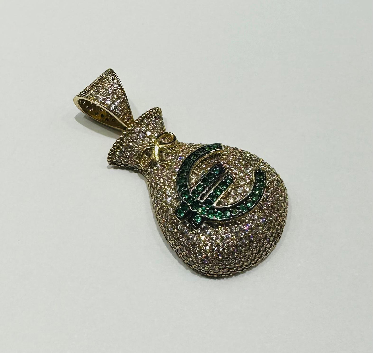 10K GOLD MONEY BAG WITH SAPPHIRE STONES- WEIGHT: 7.4gm