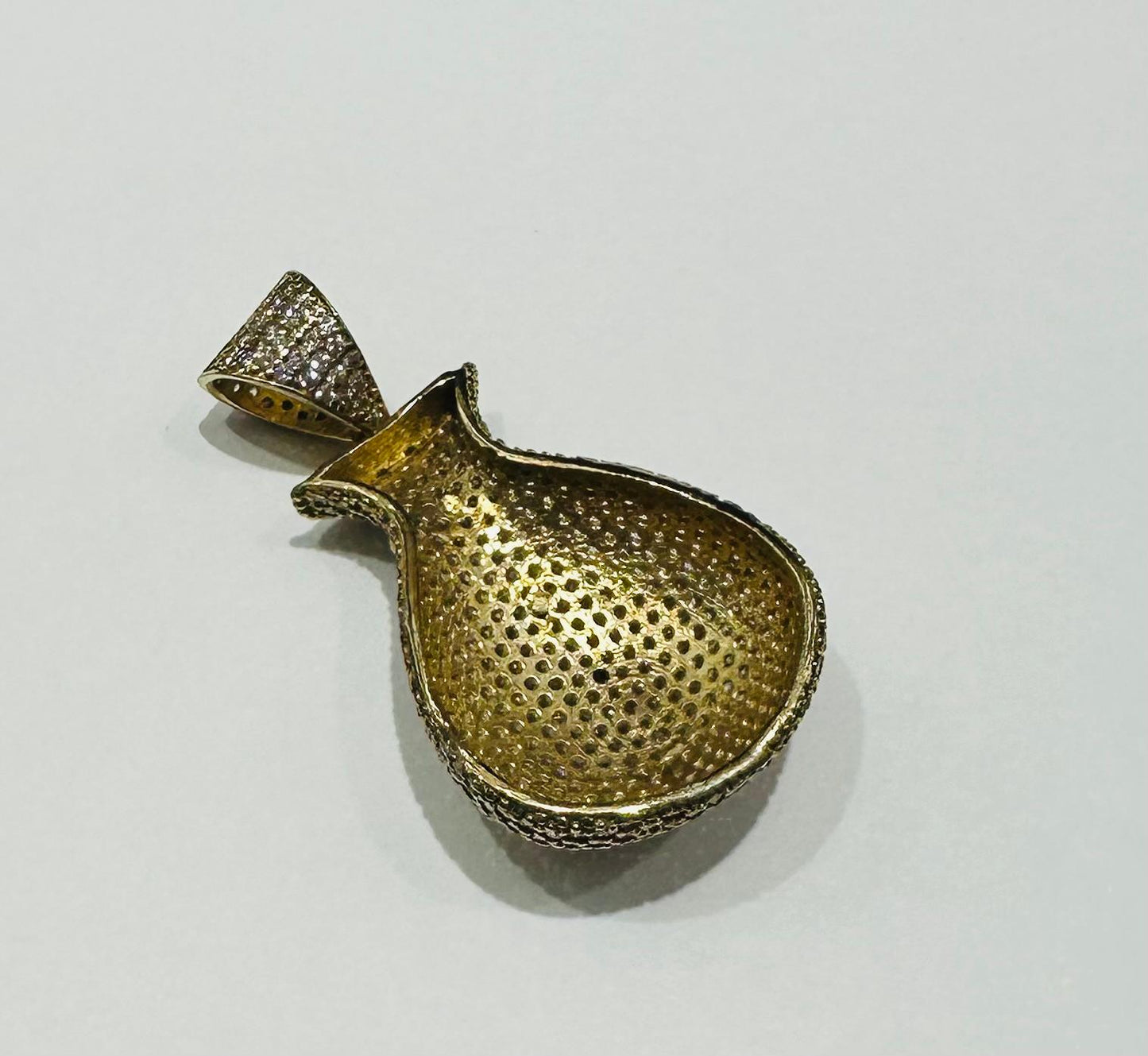 10K GOLD MONEY BAG WITH SAPPHIRE STONES- WEIGHT: 7.4gm