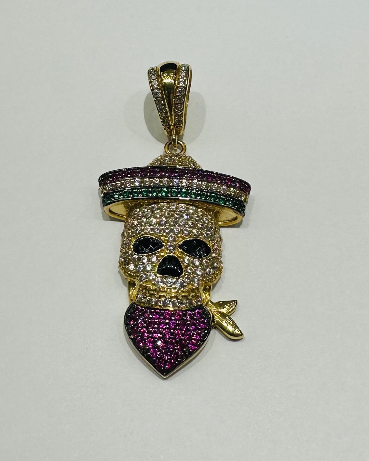 10K GOLD SKULL PENDANT WITH SAPPHIRE STONES- WEIGHT: 6.6gm