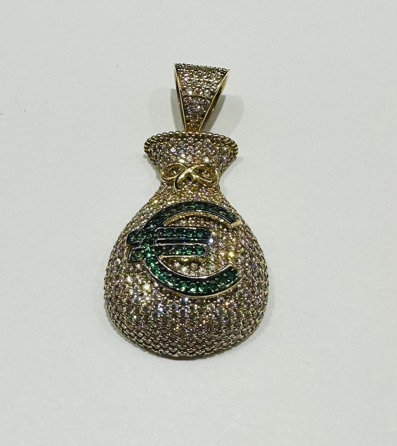 10K GOLD MONEY BAG WITH SAPPHIRE STONES- WEIGHT: 7.4gm