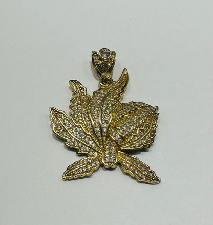 10K GOLD LEAF PENDANT WITH SAPPHIRE STONES- WEIGHT: 7.5gm