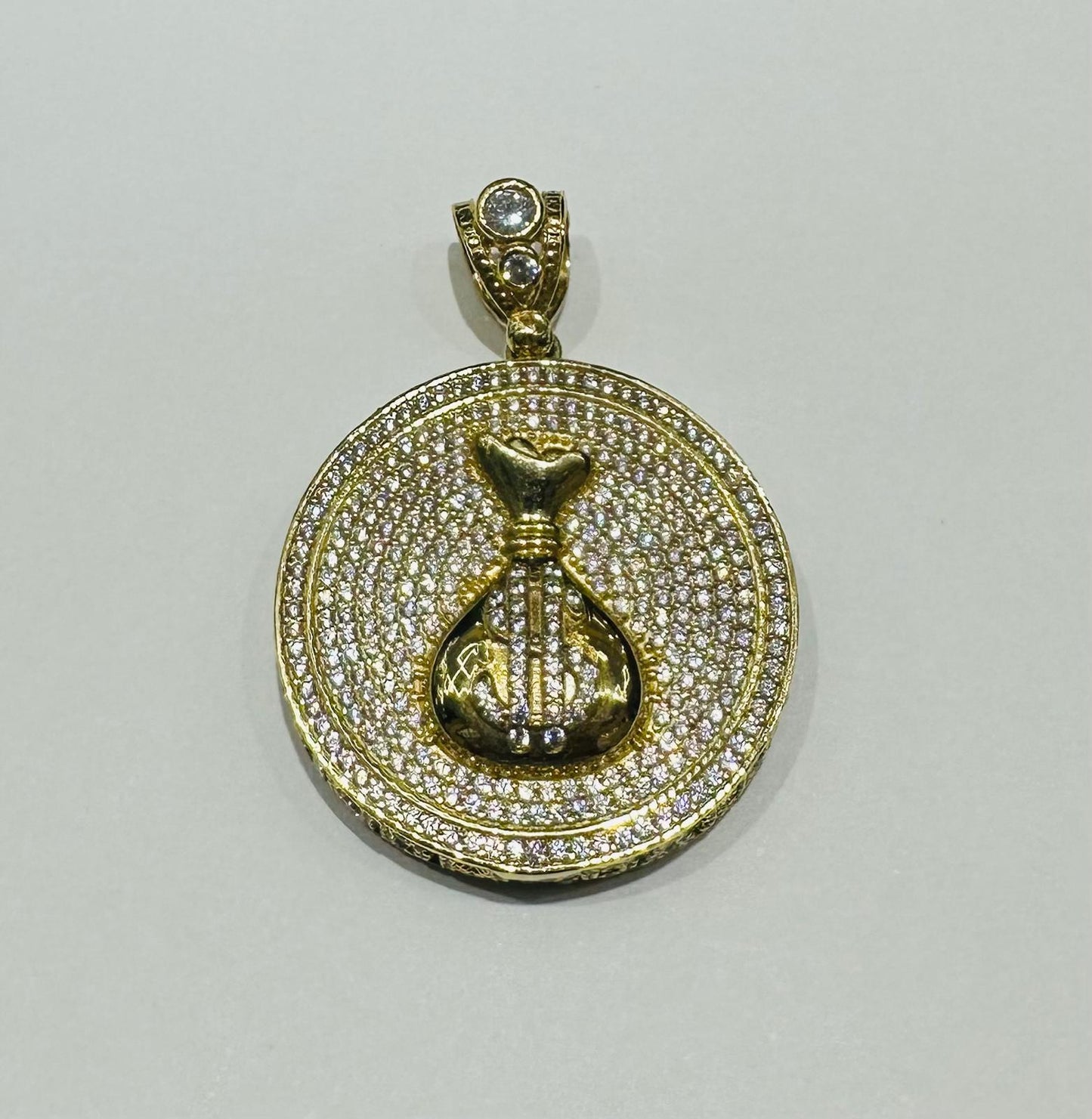 10K GOLD MONEYBAG PENDANT WITH WHITE SAPPHIRE- WEIGHT: 12.3gm