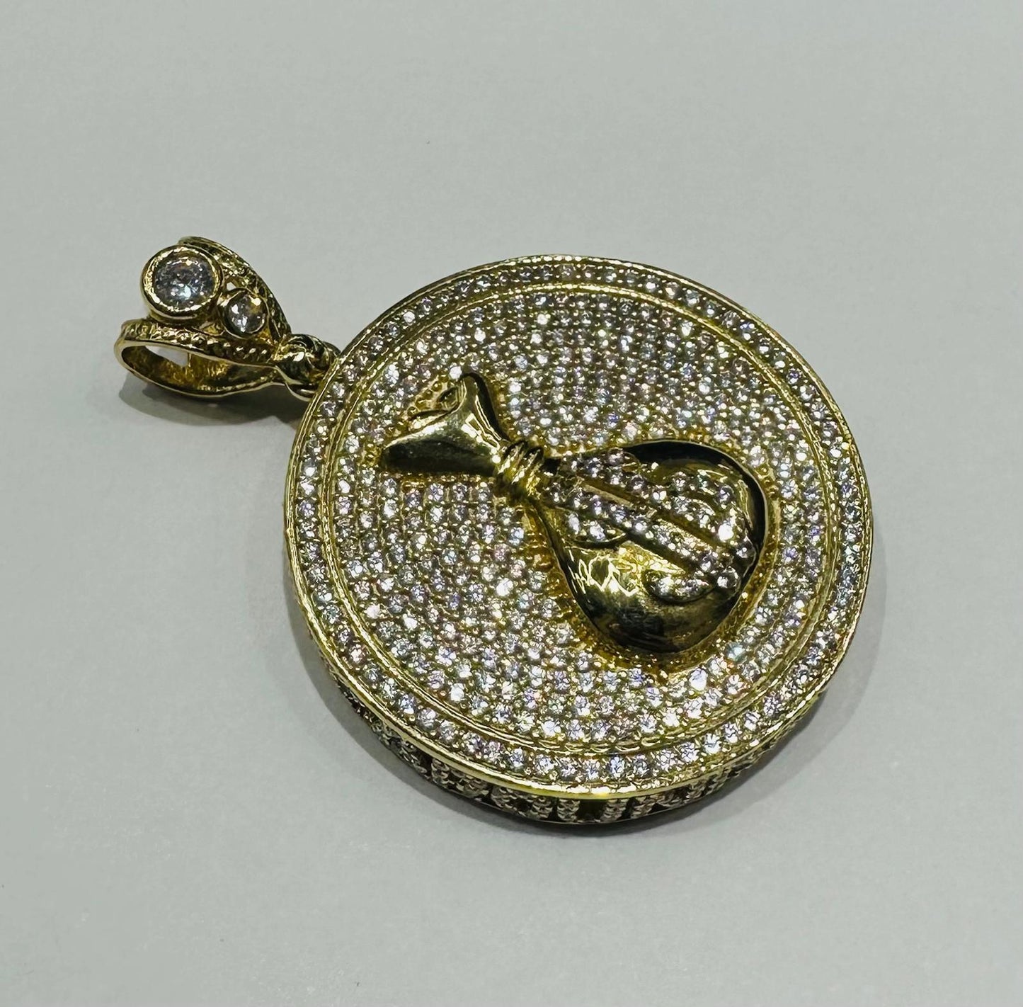 10K GOLD MONEYBAG PENDANT WITH WHITE SAPPHIRE- WEIGHT: 12.3gm