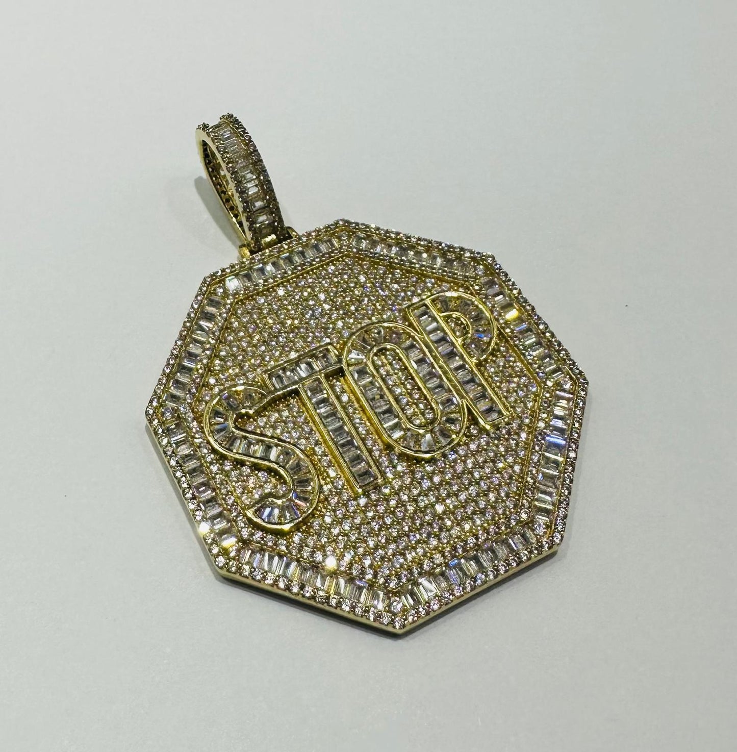 10K GOLD "STOP" BAGUETTE PENDANT WITH WHITE SAPPHIRE- WEIGHT: 16.9gm