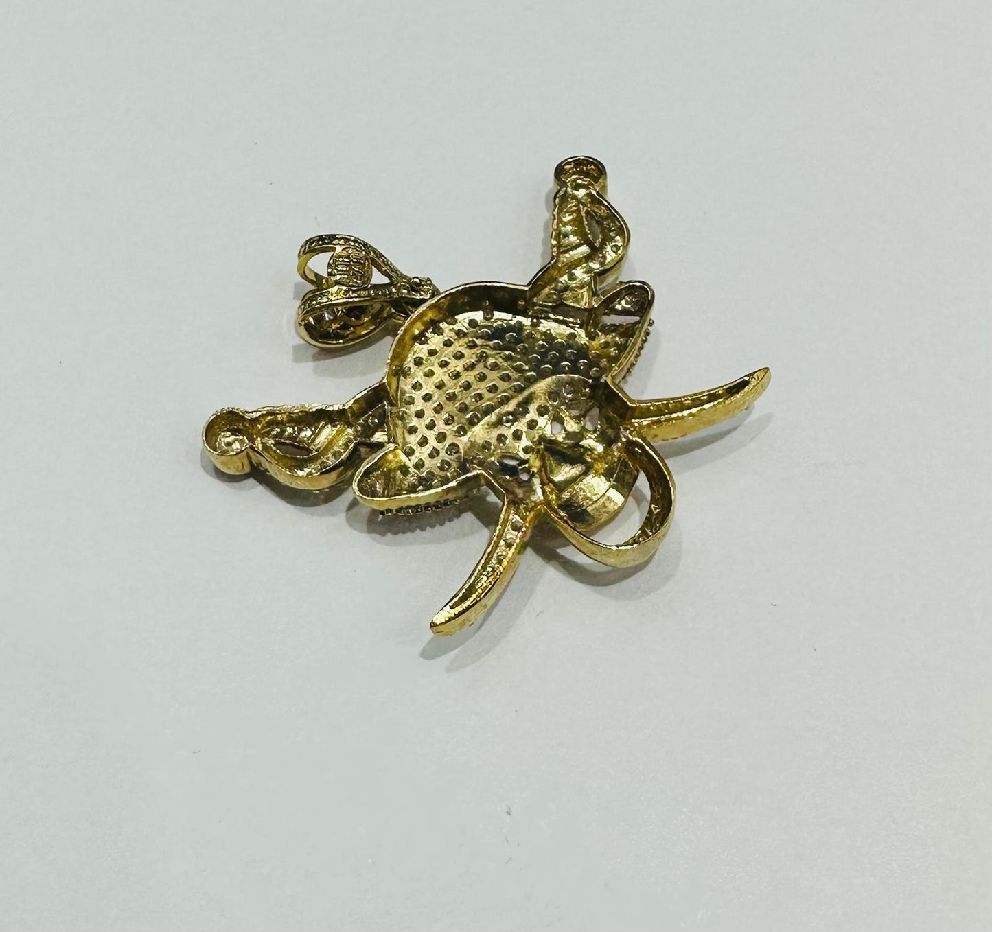 10K GOLD SKULL PENDANT WITH WHITE SAPPHIRE- WEIGHT: 7.5gm