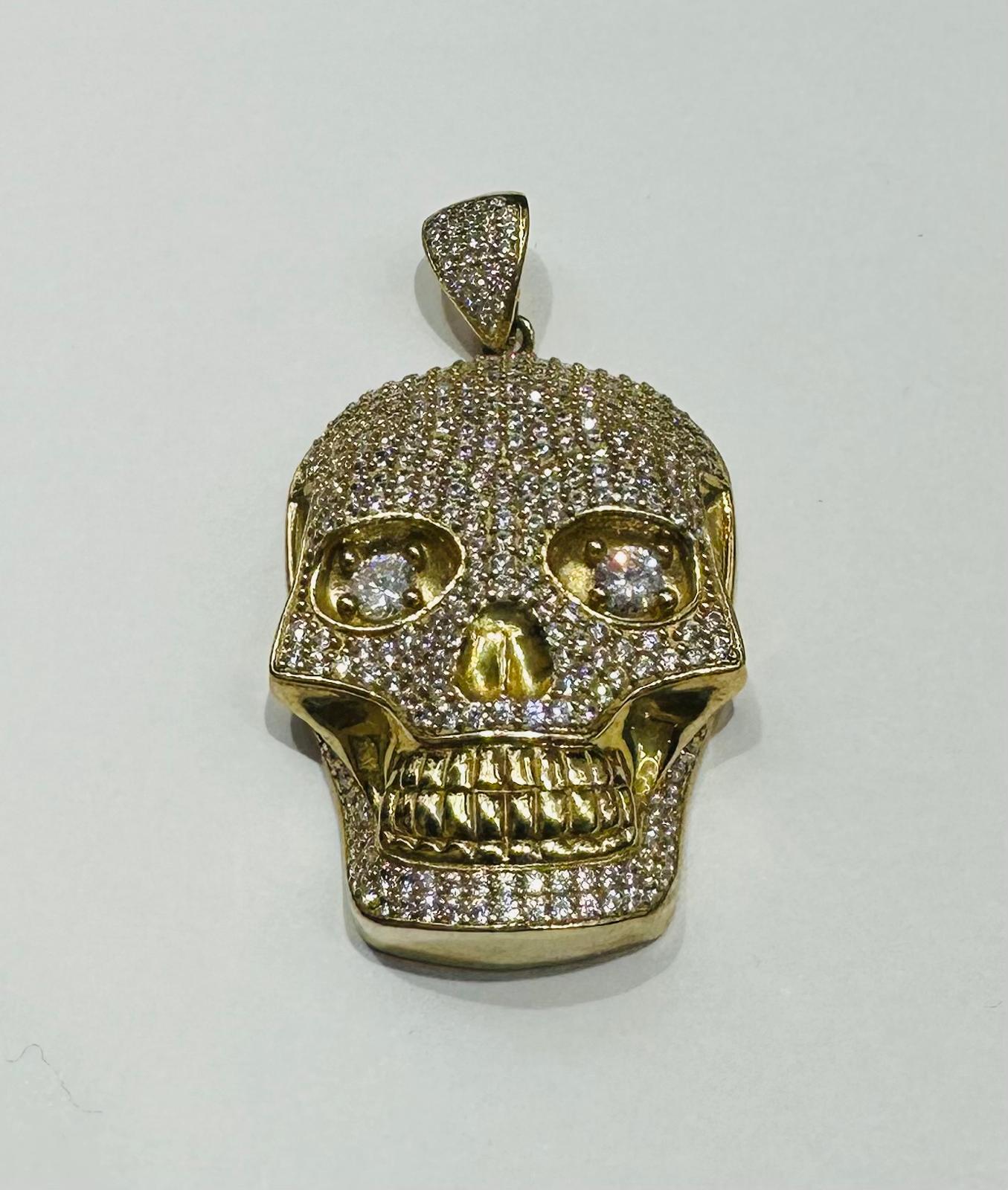 10K GOLD SKULL PENDANT WITH WHITE SAPPHIRE- WEIGHT: 14.5gm