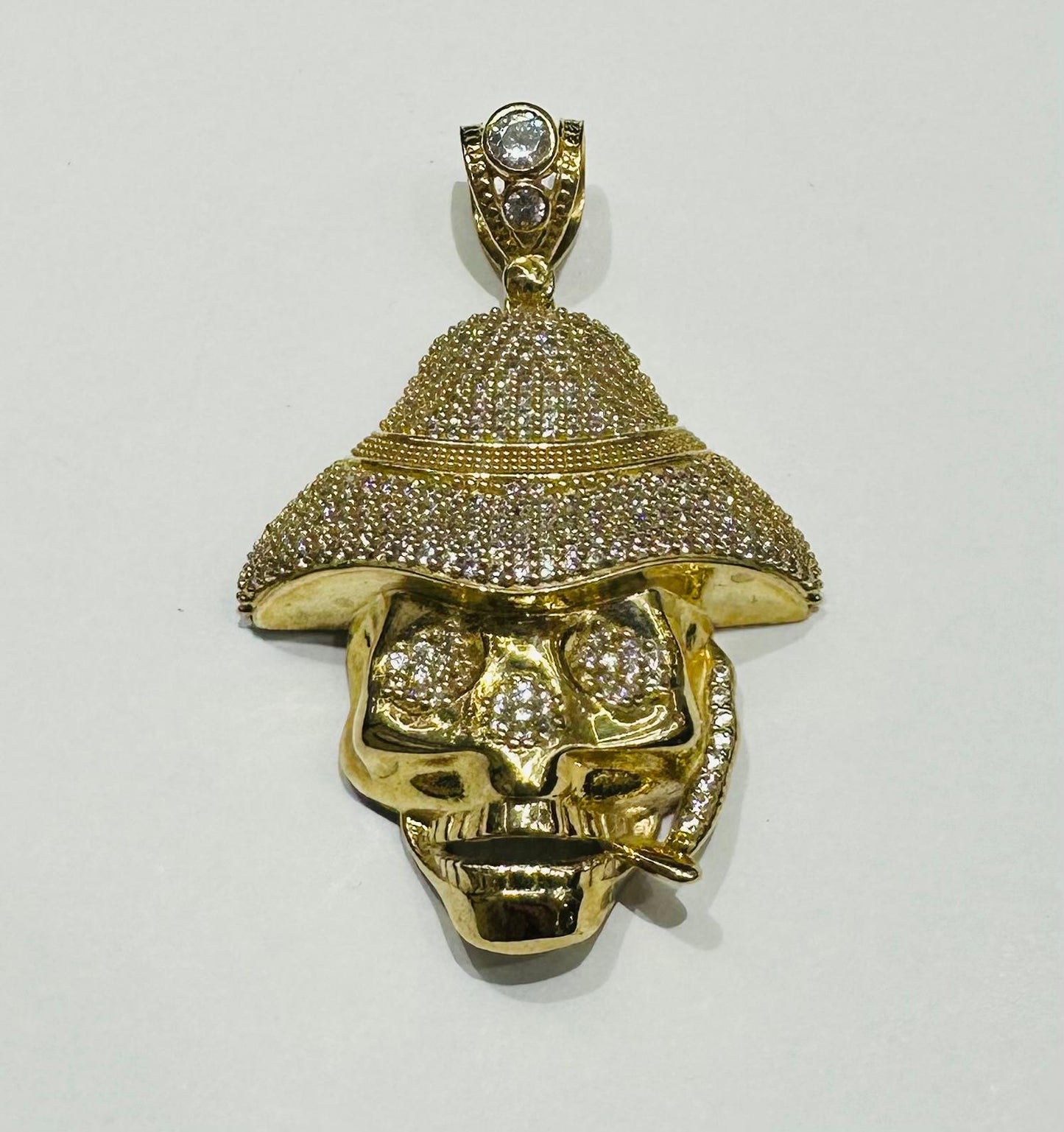 10K GOLD SKULL PENDANT WITH WHITE SAPPHIRE- WEIGHT: 13.1gm