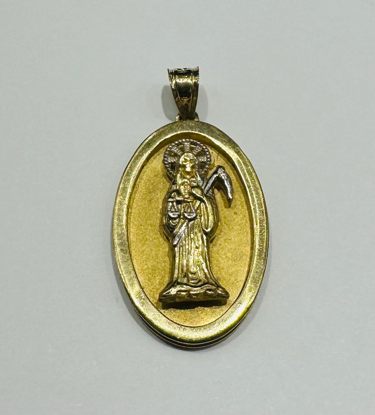 10K GOLD TWO TONED SANTA MUERTE PENDANT- WEIGHT: 3.3gm