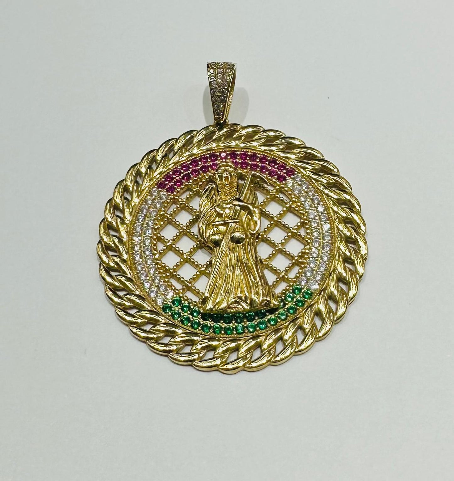 10K GOLD SANTA MUERTE PENDANT WITH SAPPHIRE STONES- WEIGHT: 10.5gm