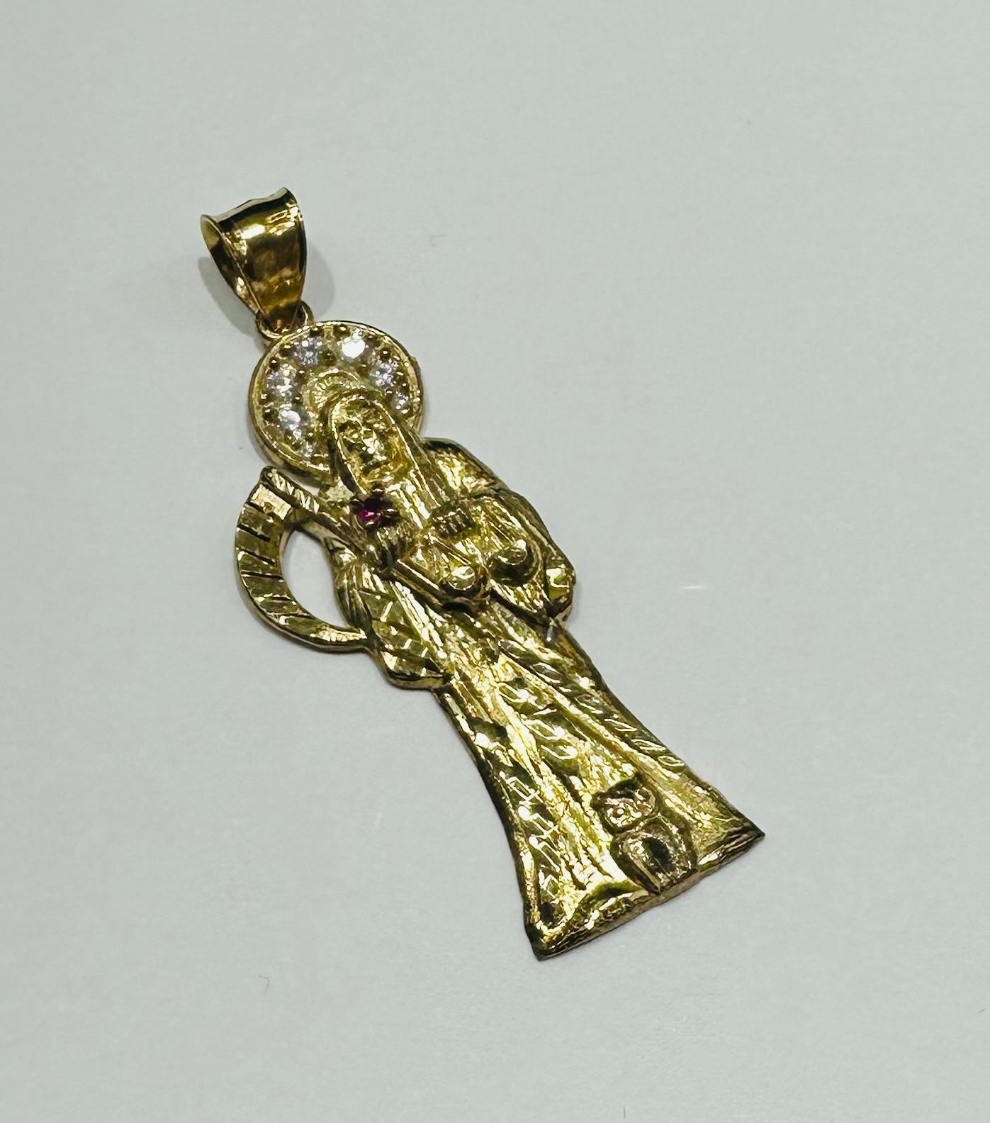 10K GOLD SANTA MUERTE PENDANT WITH SAPPHIRE STONES- WEIGHT: 3.0gm