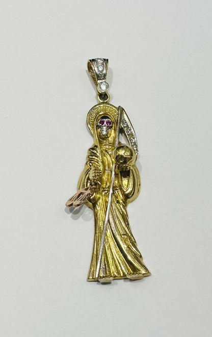10K GOLD SANTA MUERTE PENDANT WITH SAPPHIRE STONES- WEIGHT: 13.6gm