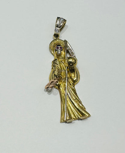 10K GOLD SANTA MUERTE PENDANT WITH SAPPHIRE STONES- WEIGHT: 13.6gm