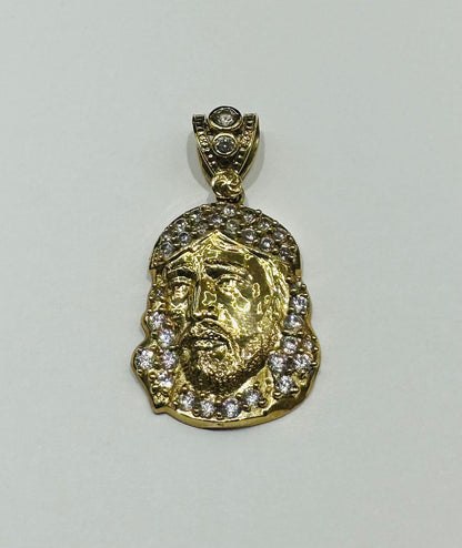 10K GOLD JESUS FACE PENDANT WITH WHITE SAPPHIRE- WEIGHT: 3.5gm