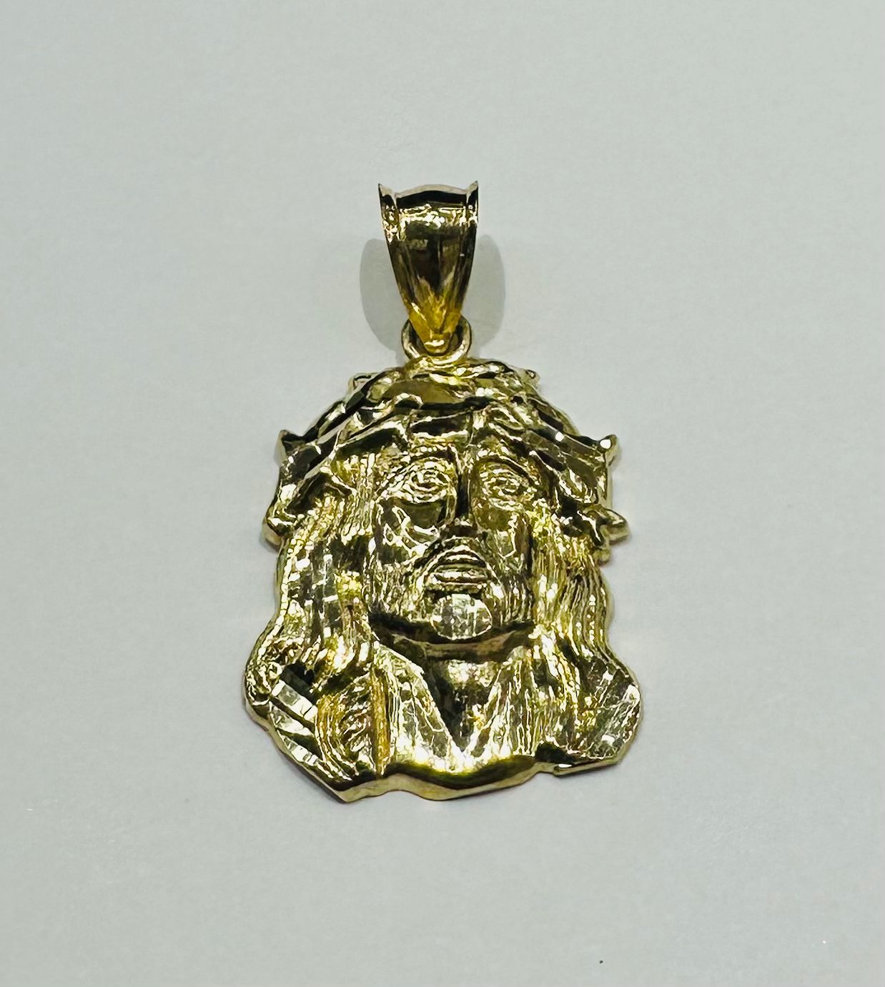 10K GOLD JESUS FACE PENDANT- WEIGHT: 2.3gm