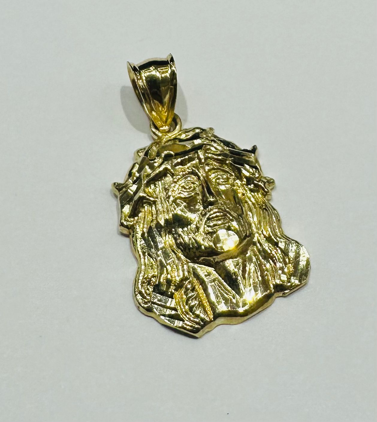 10K GOLD JESUS FACE PENDANT- WEIGHT: 2.3gm