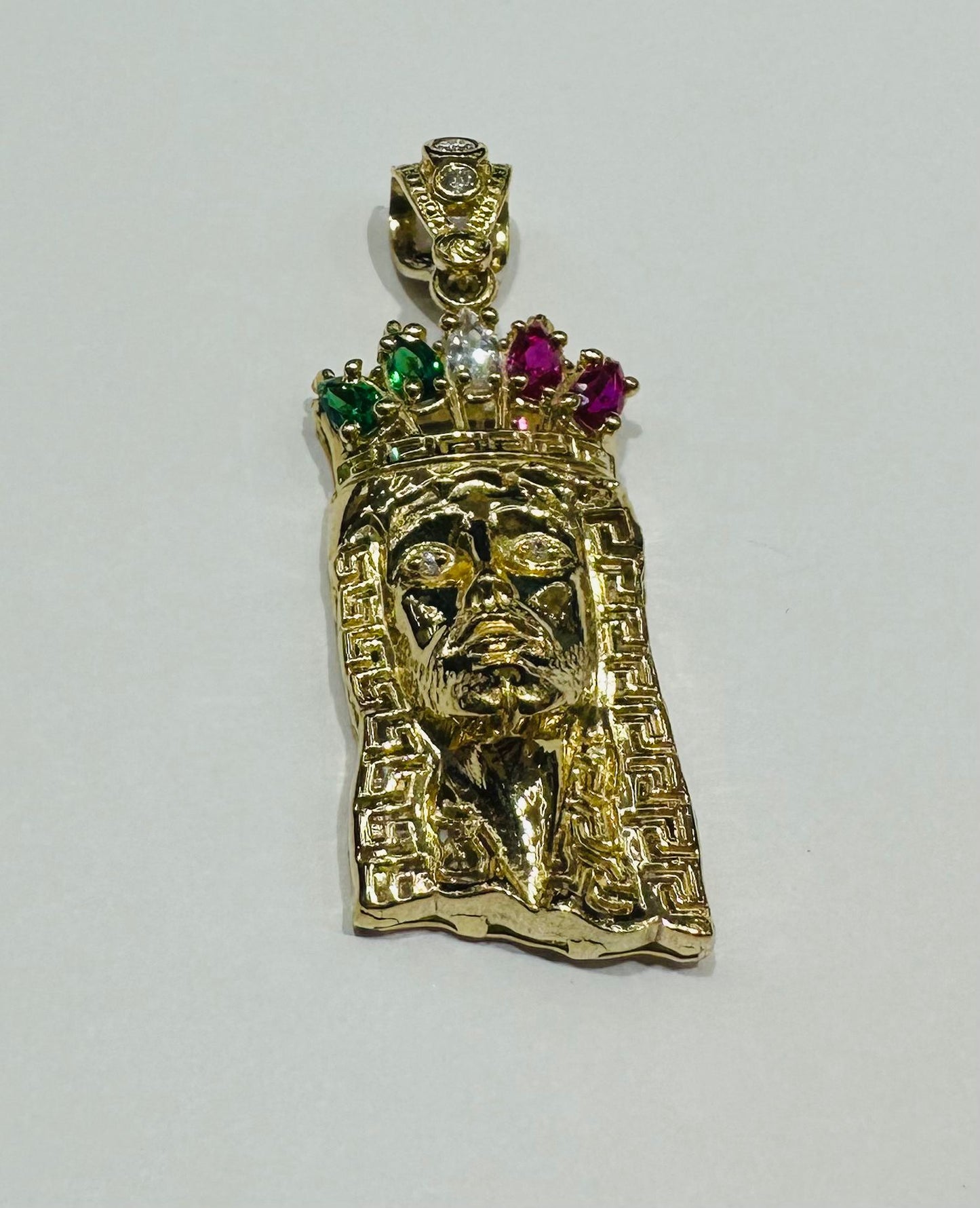 10K GOLD JESUS FACE PENDANT WITH SAPPHIRE STONES- WEIGHT: 6.6gm