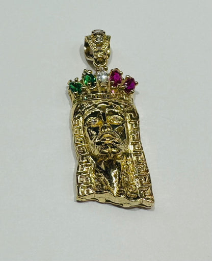 10K GOLD JESUS FACE PENDANT WITH SAPPHIRE STONES- WEIGHT: 6.6gm