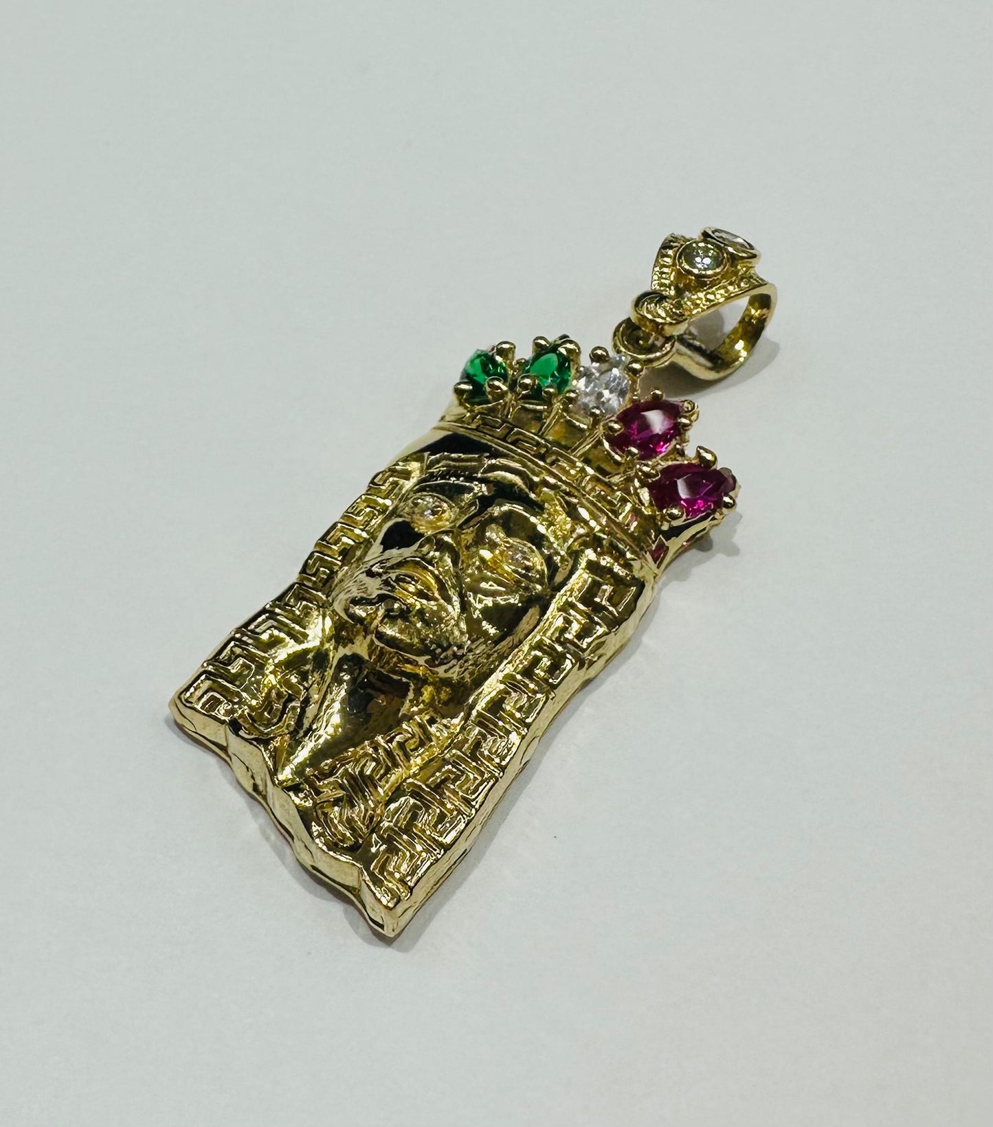 10K GOLD JESUS FACE PENDANT WITH SAPPHIRE STONES- WEIGHT: 6.6gm