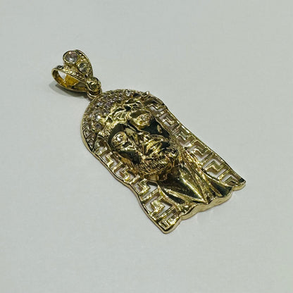 10K GOLD JESUS PENDANTWITH WHITE SAPPHIRE- WEIGHT: 4.1gm