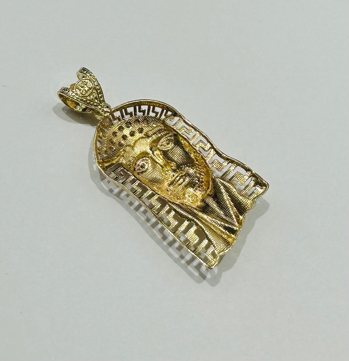 10K GOLD JESUS PENDANTWITH WHITE SAPPHIRE- WEIGHT: 4.1gm