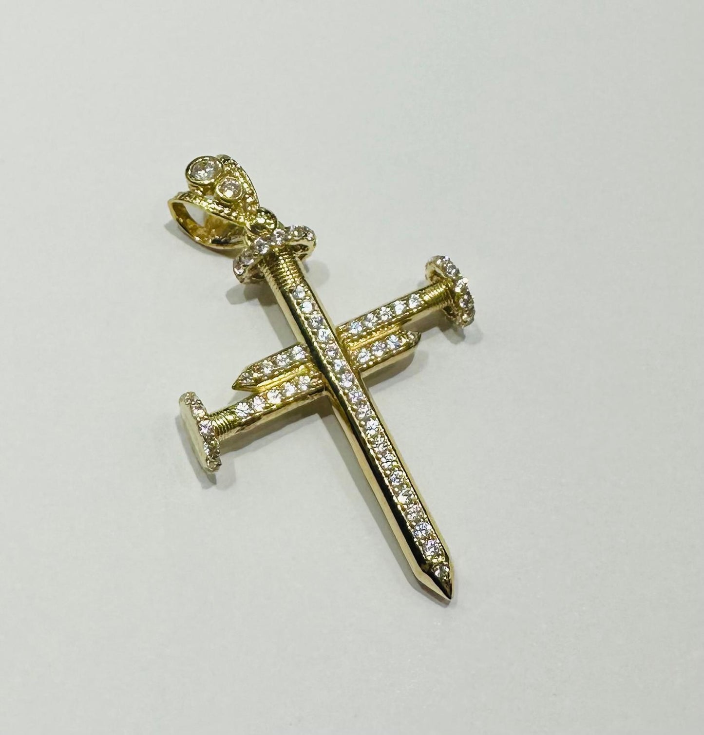 10K GOLD CROSS NAIL PENDANT WITH WHITE SAPPHIRE- WEIGHT: 5.3gm